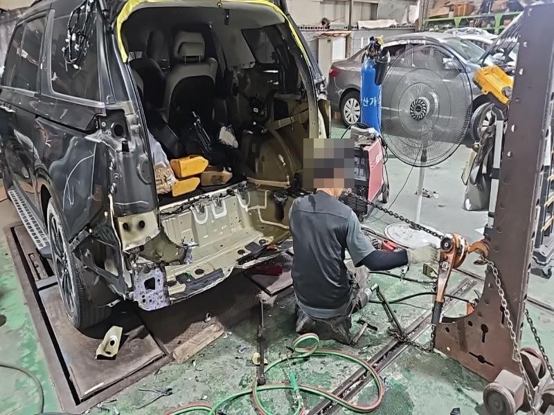 카니발 리어 사이드멤버 견인 판금